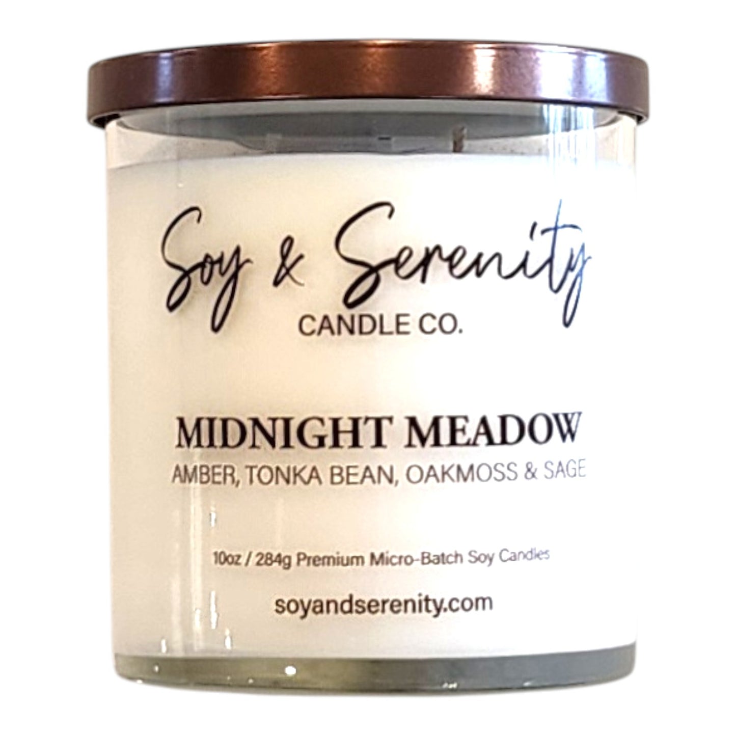 Midnight Meadow amber soy candle with tonka and oakmoss notes on a white background, amber candle.