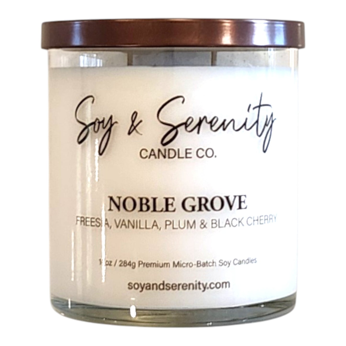 Noble Grove luxury soy candle with plum, black cherry, freesia, and vanilla notes on a white background.