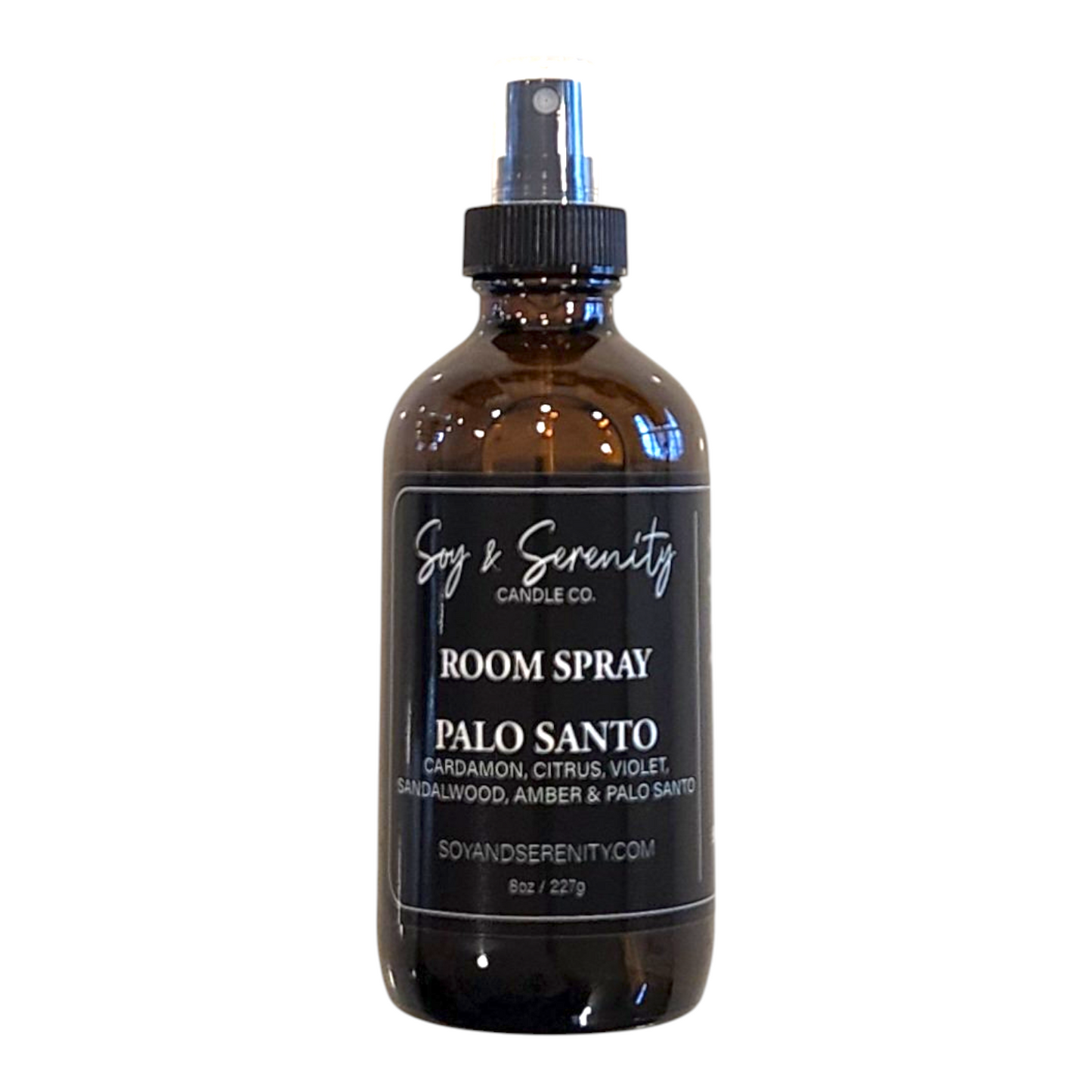 Palo Santo room spray bottle with notes of cardamom, citrus, violet, sandalwood, amber, and palo santo on a white background.