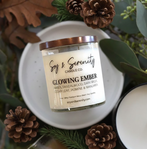 Cozy Christmas candle gift styled with pinecones and greenery, a thoughtful last-minute holiday gift idea