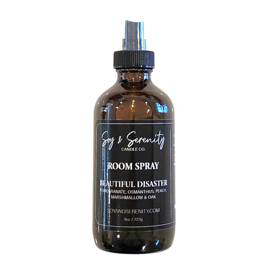 Room spray with pomegranate, peach, apple, and marshmallow notes on a white background, clean fruity air freshener.