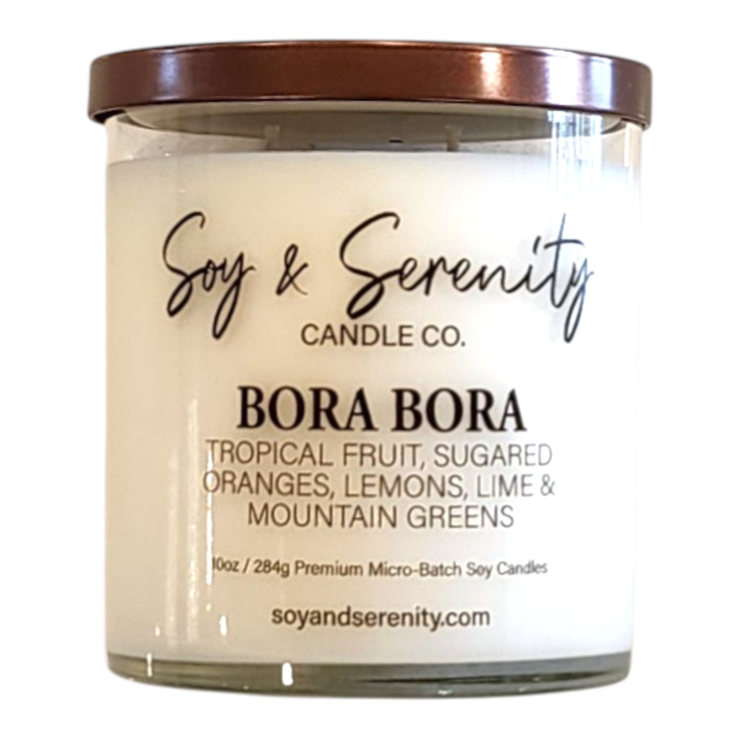 Bora Bora beach candle in a clear glass jar on a white background, tropical soy candle with a hint of coconut breeze.