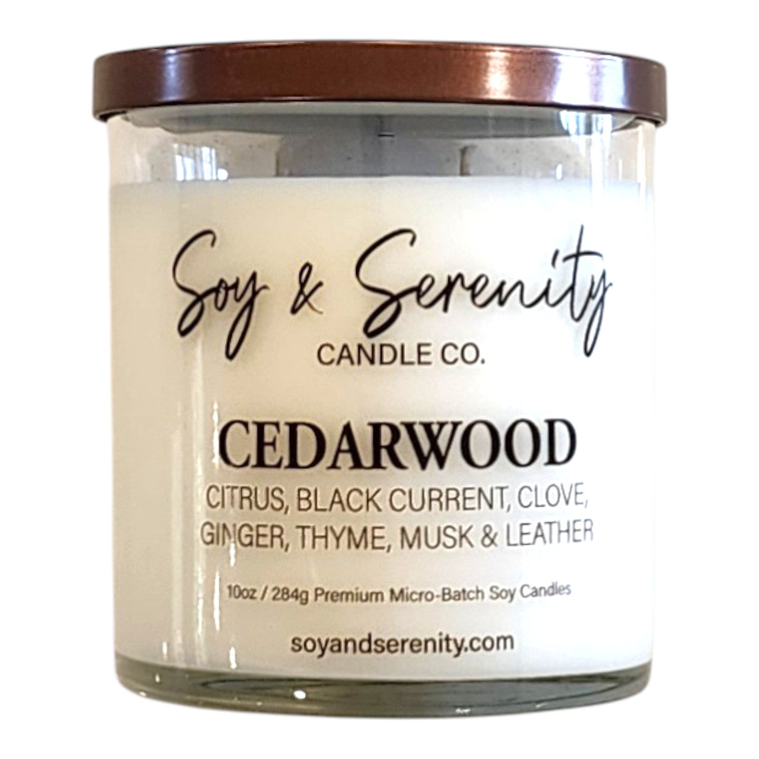 Cedarwood wood candle in a clear glass jar on a white background, true cedar soy candle.