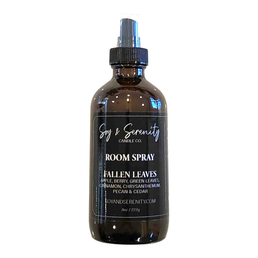 Room spray with cinnamon, patchouli, cedarwood, and sandalwood — cozy fall and autumn leaves air freshener on white background