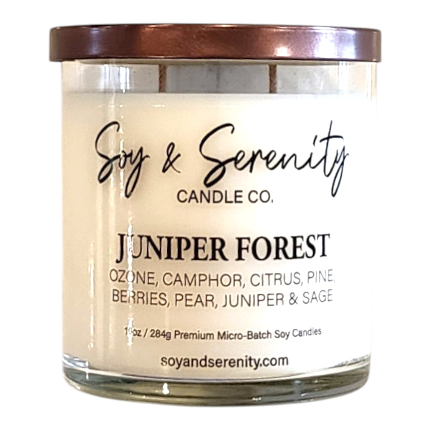 Juniper Forest eucalyptus soy candle in a clear glass jar on a white background, forest candle.