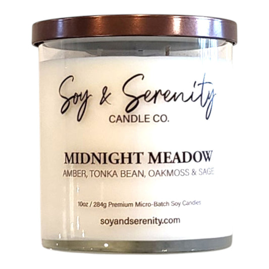 Midnight Meadow amber soy candle with tonka and oakmoss notes on a white background, amber candle.