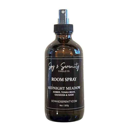 Room spray with amber, tonka bean, oakmoss, and sage notes on a white background, clean masculine air freshener.