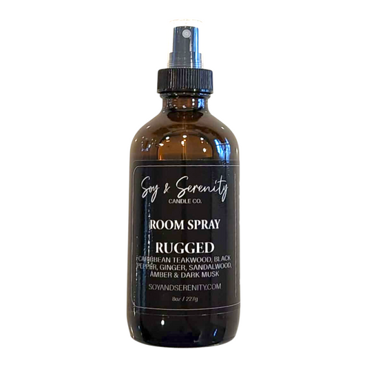 Room spray with Caribbean teakwood, black pepper, ginger, sandalwood, amber, and dark musk notes on a white background, masculine non toxic air freshener.