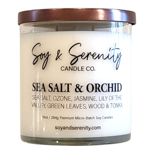 Sea Salt & Orchid soy candle with sea salt, orchid, freesia, and amber notes on a white background.